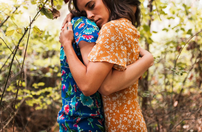 women hugging